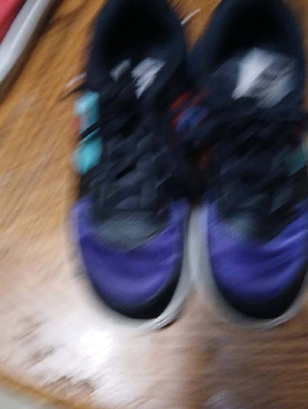 Nike Kids Sneakers in Black with Purple, Teal & Orange Accents